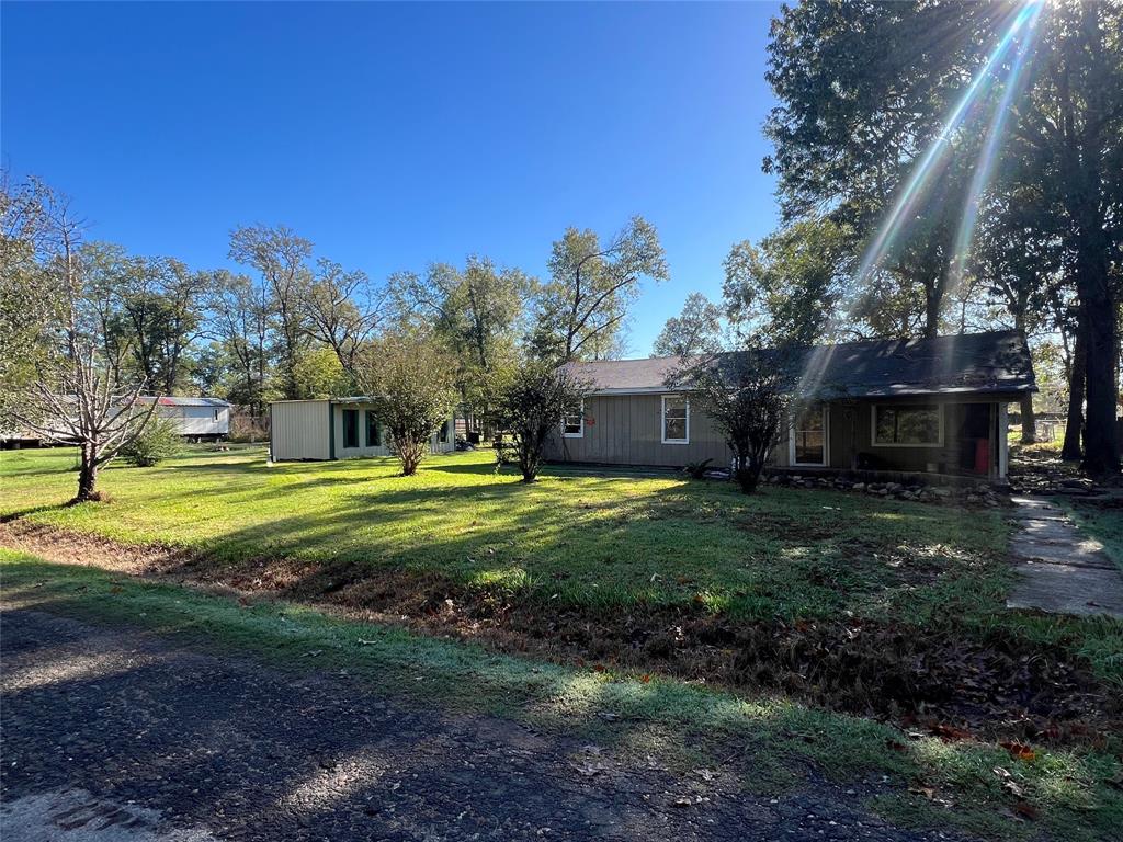 a view of a house with a big yard