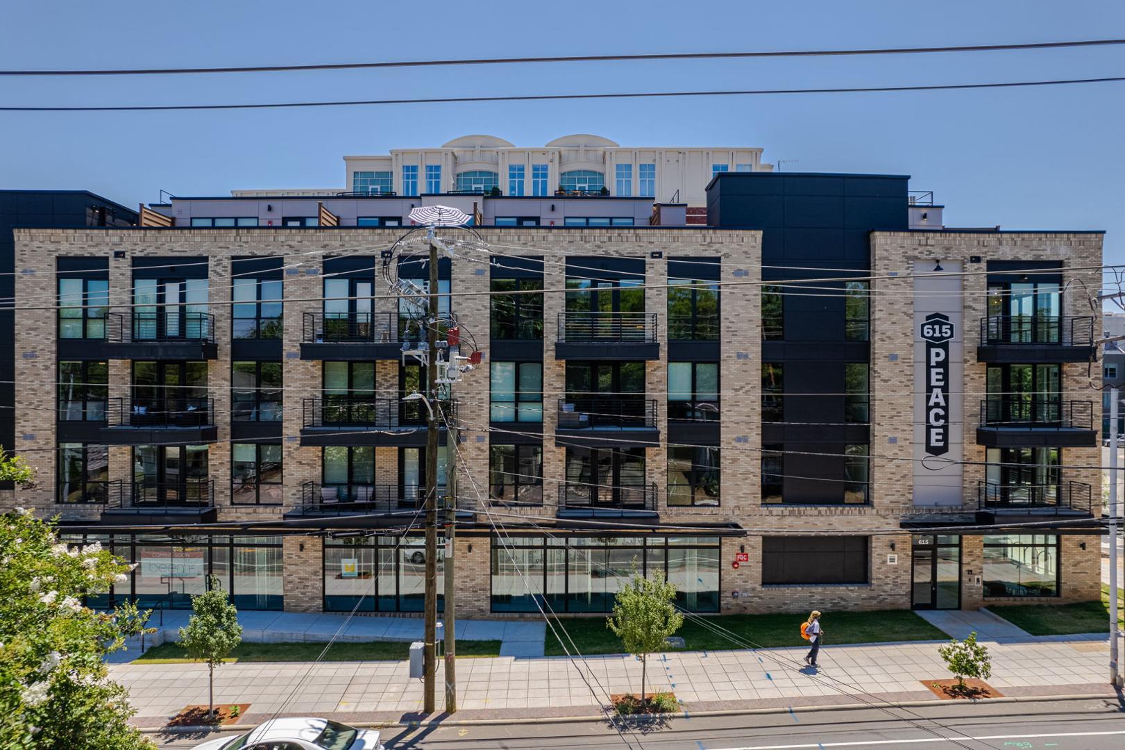 a front view of a building with street view