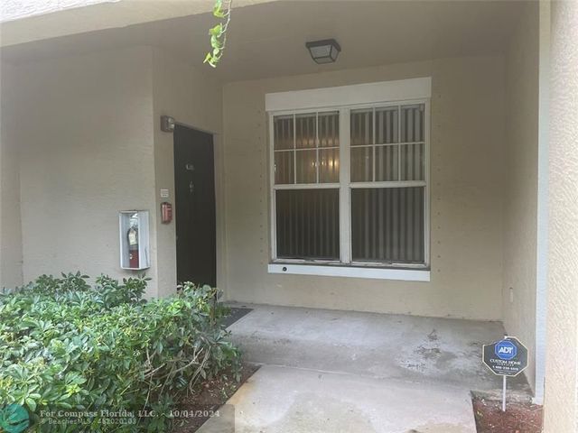 $298,000 | 5880 West Sample Road, Unit 104 | Coral Springs