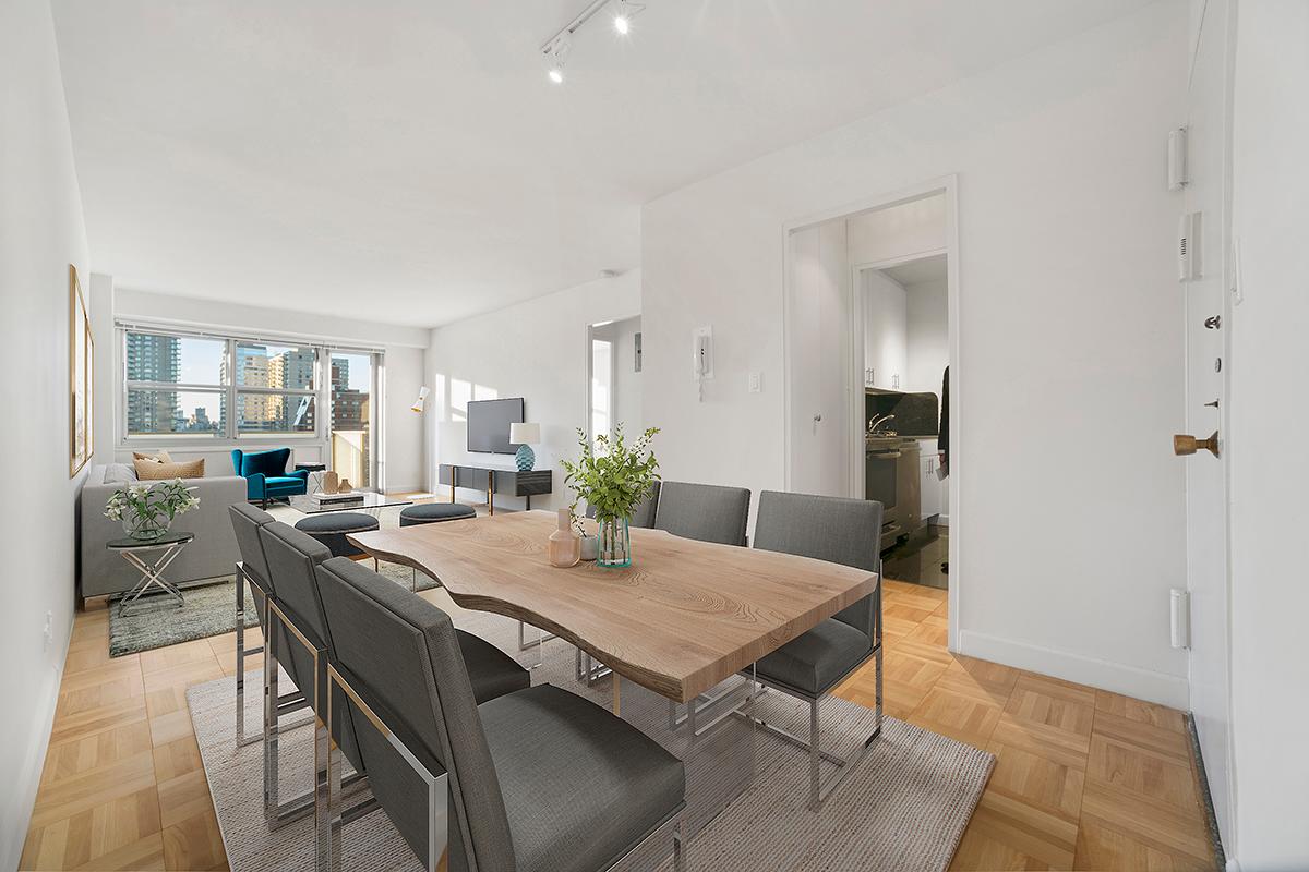 a view of a dining room with furniture