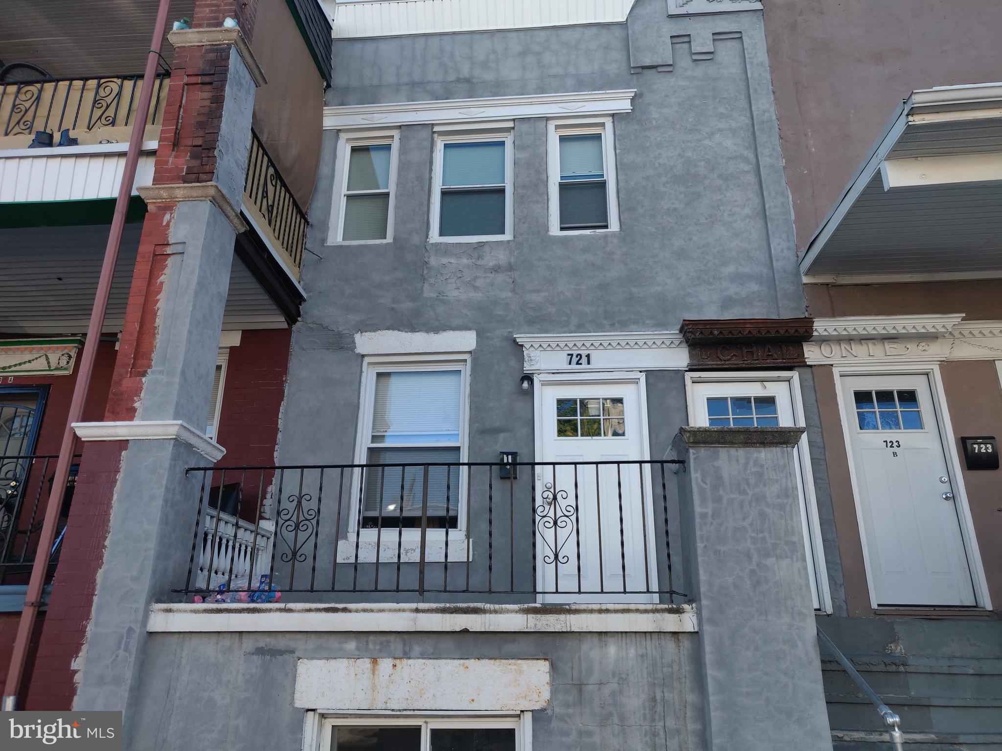 a front view of a house with balcony