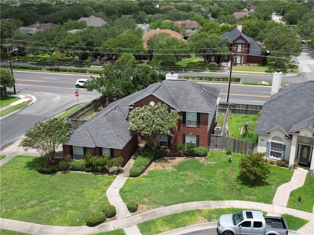 a aerial view of a house with garden