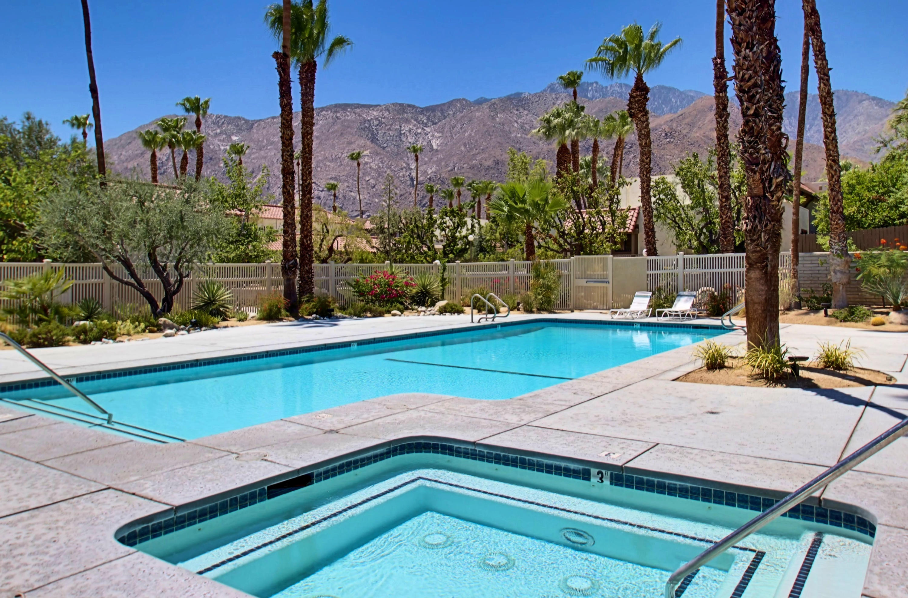 a view of a backyard with a small pool