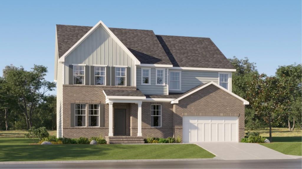 a view of a yard in front view of a house