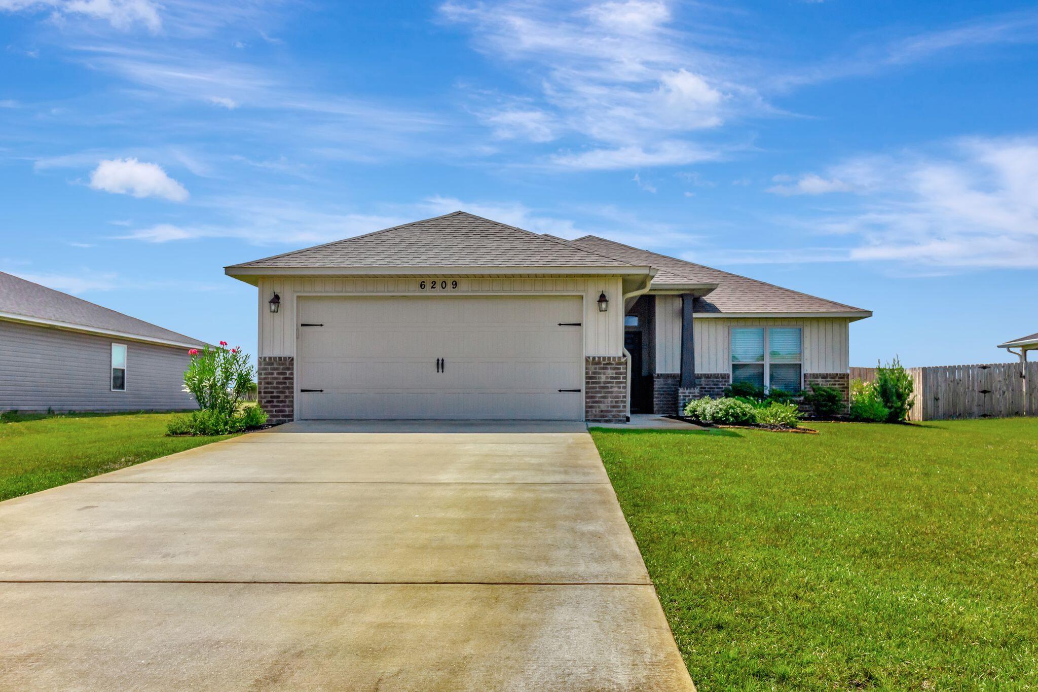 a front view of house with yard