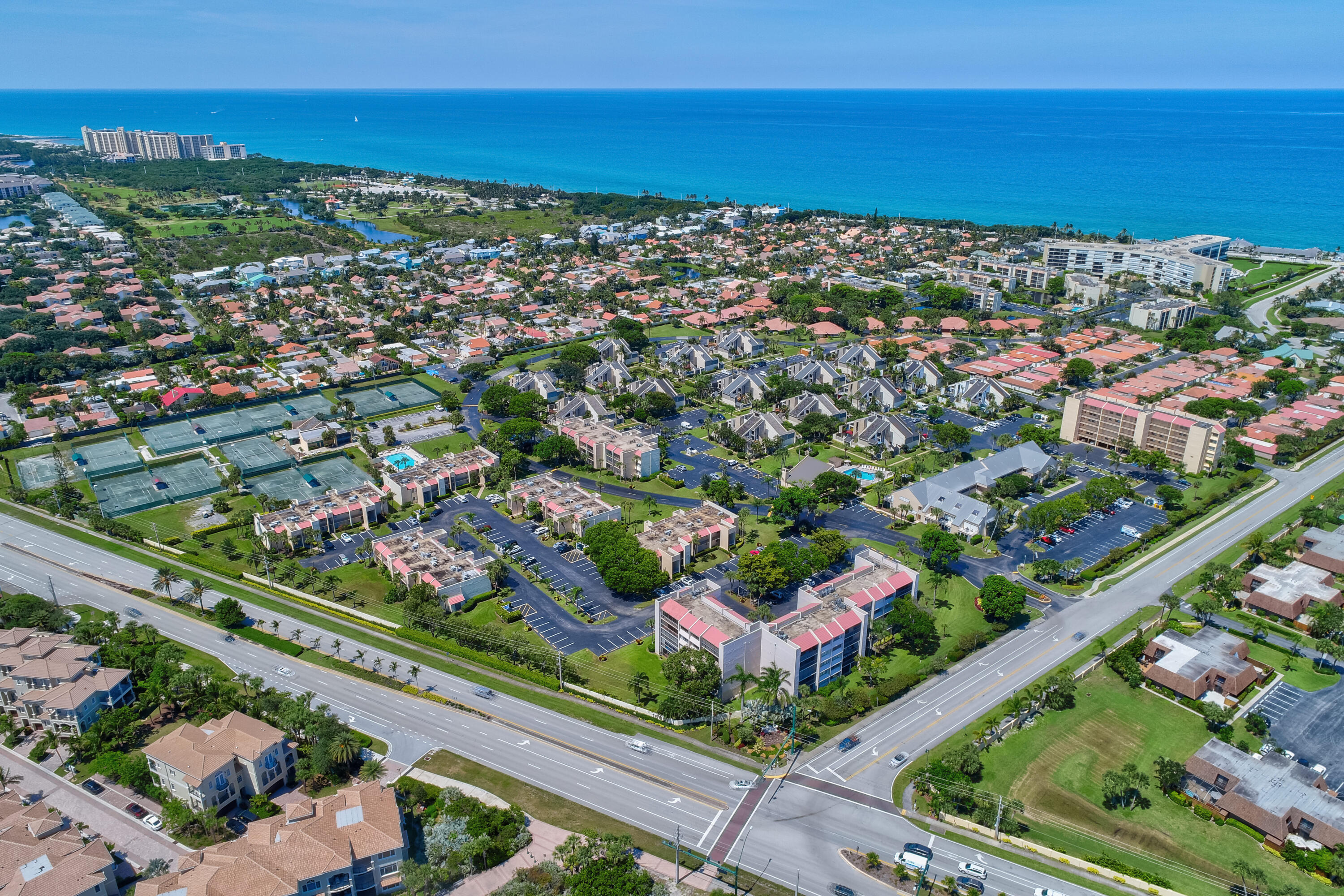 an aerial view of city and lake