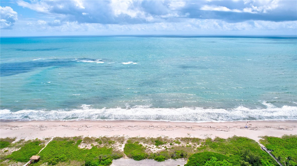 a view of beach and an ocean beach