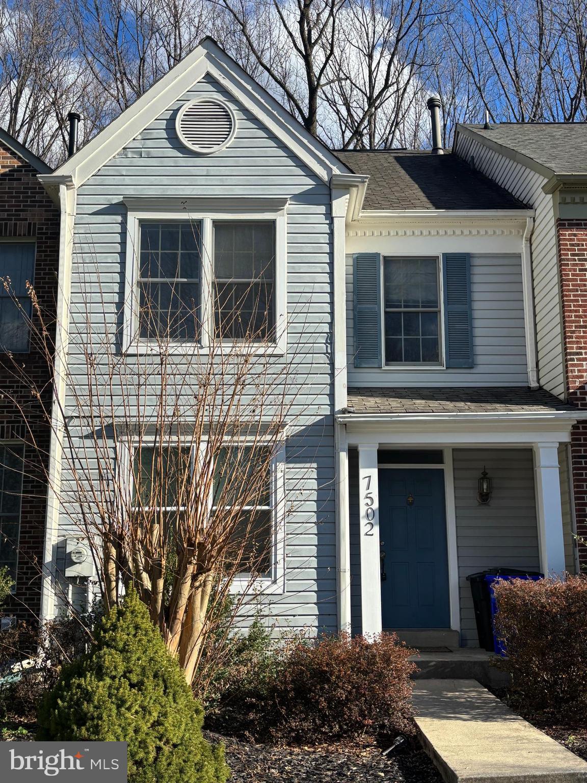 a view of a house with a door and balcony