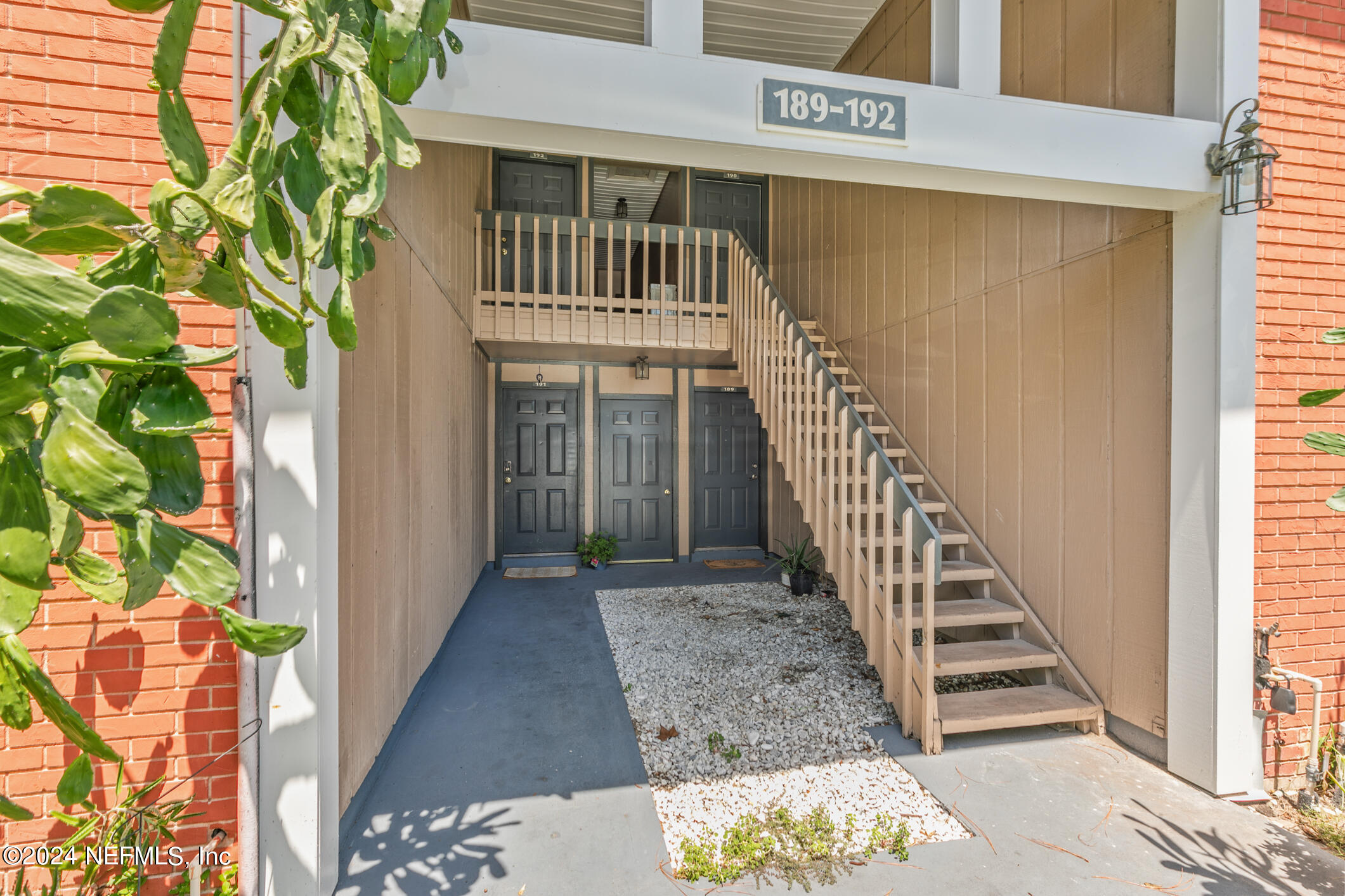 a view of a pathway of a house with entryway