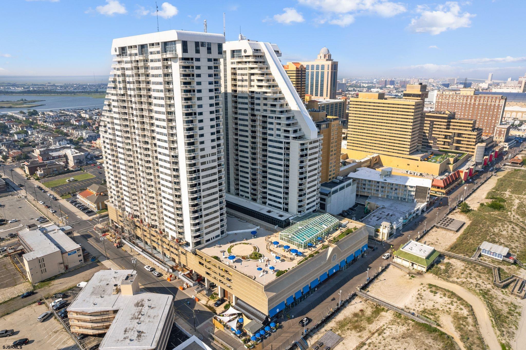 a view of a city with tall buildings