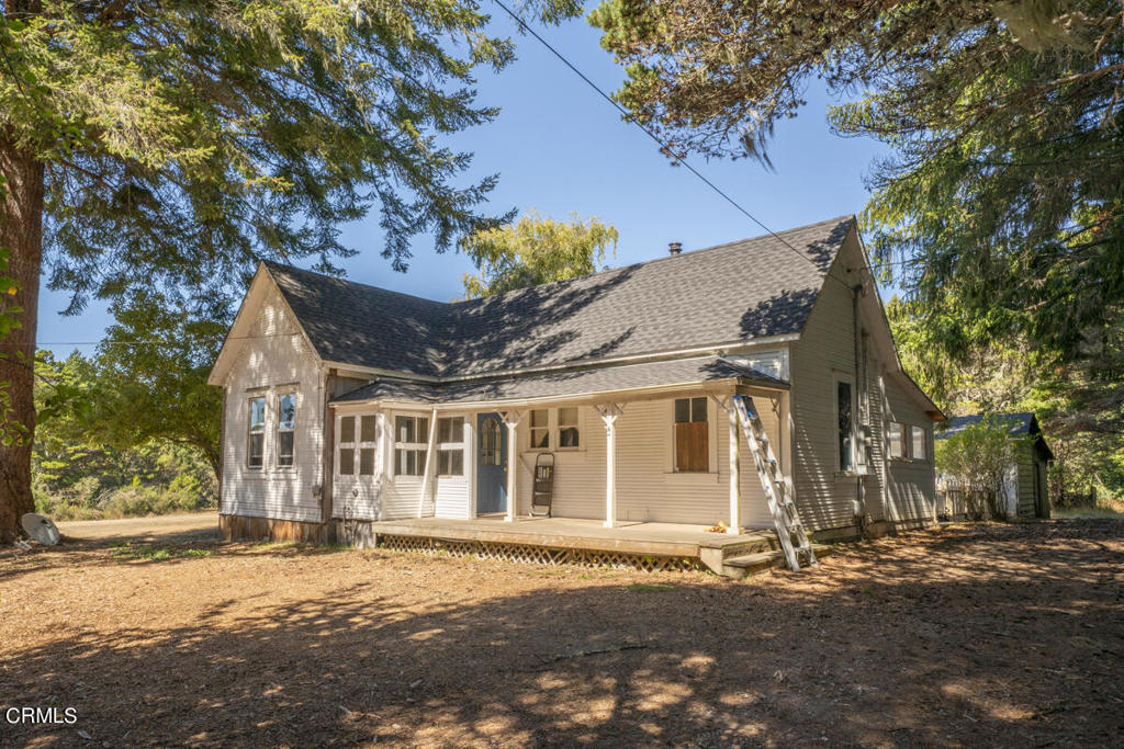 front view of a house with a street