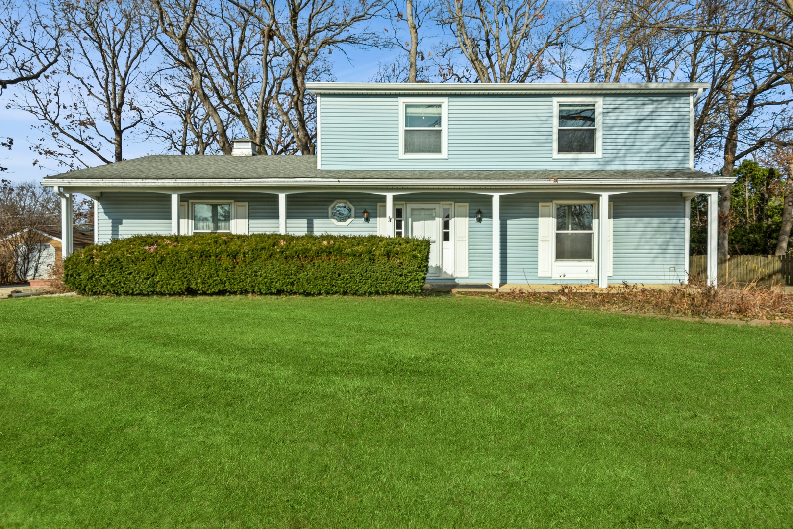 front view of a house and a yard