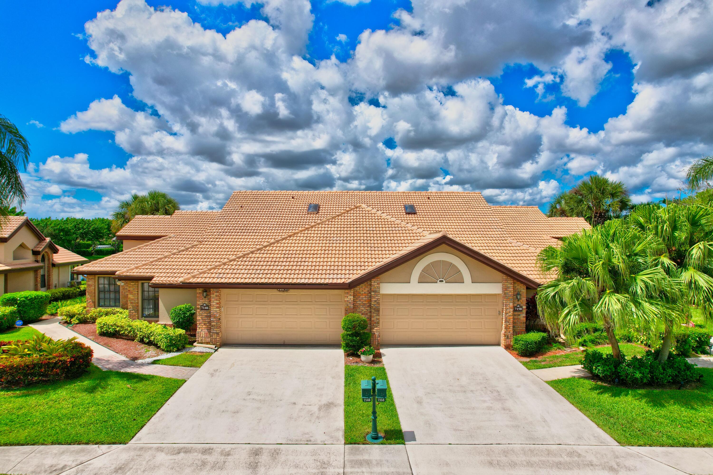 a house with yard in front of it