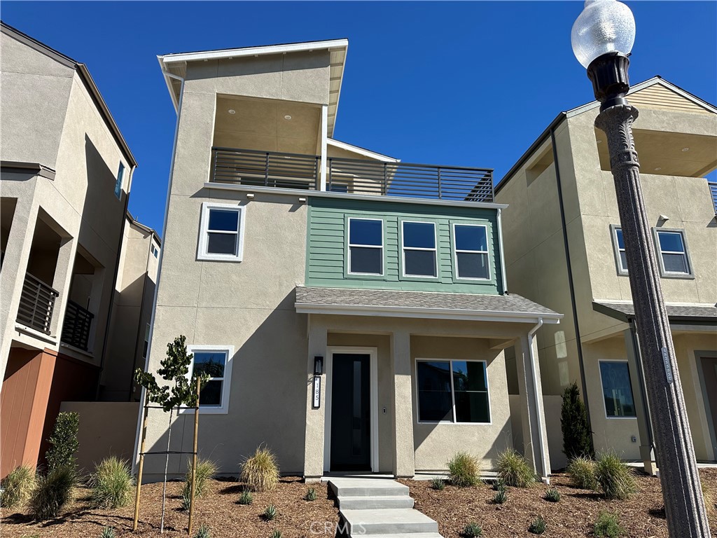 a front view of a house with parking