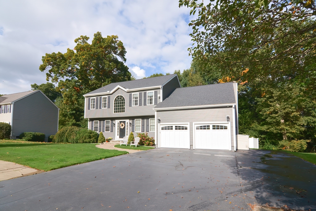 a view of house with outdoor space and street view