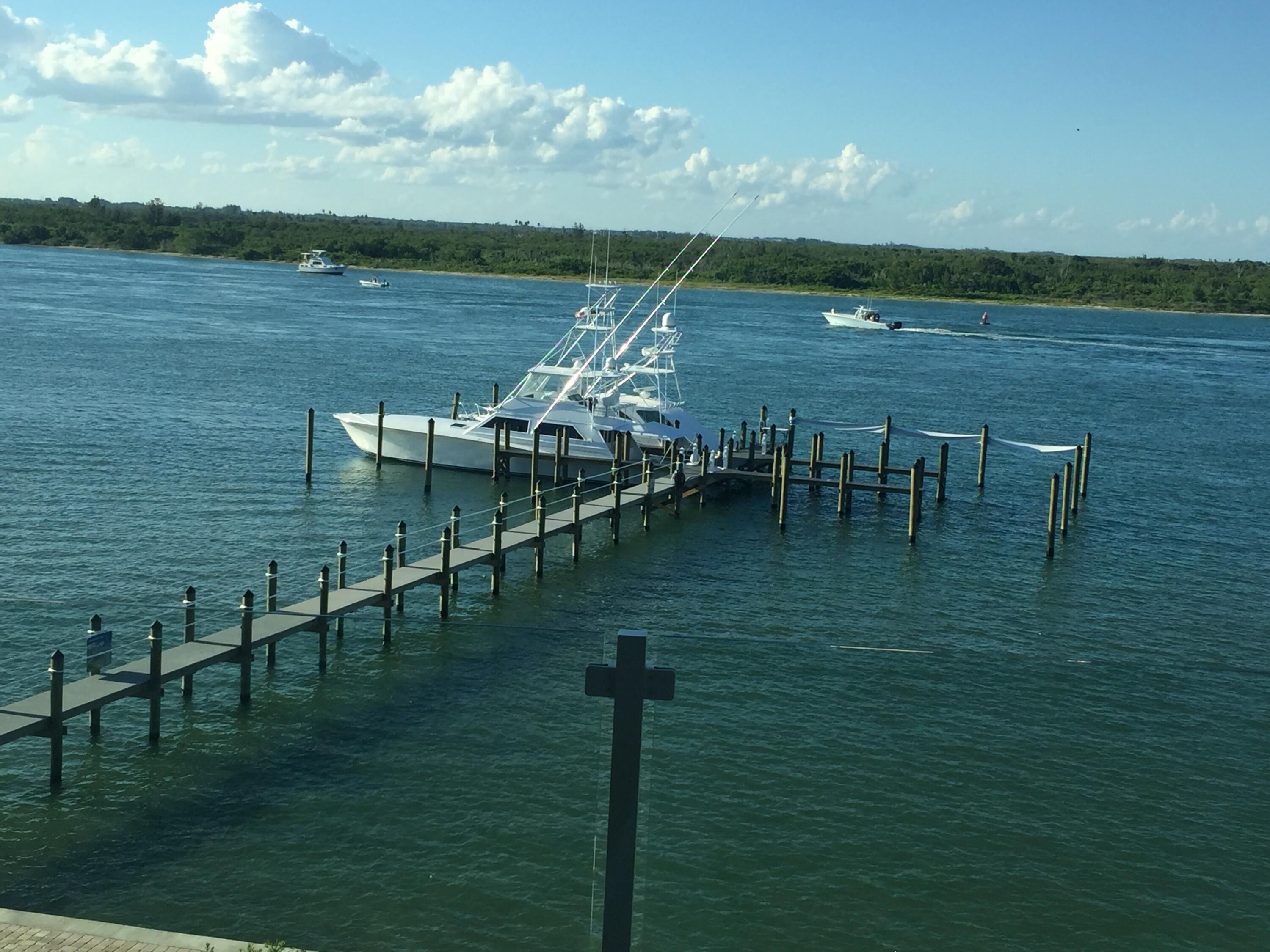 a view of a lake with a yard