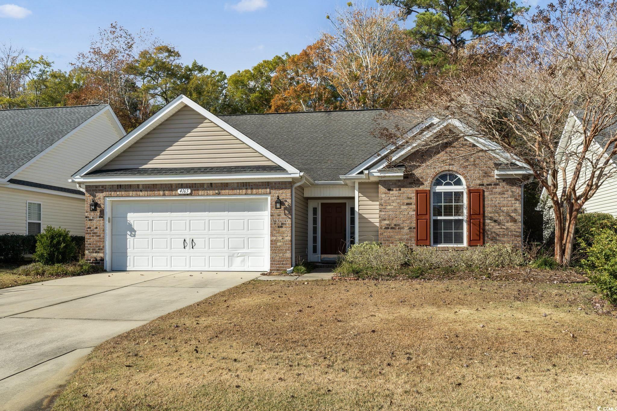 View of front of home with a garage