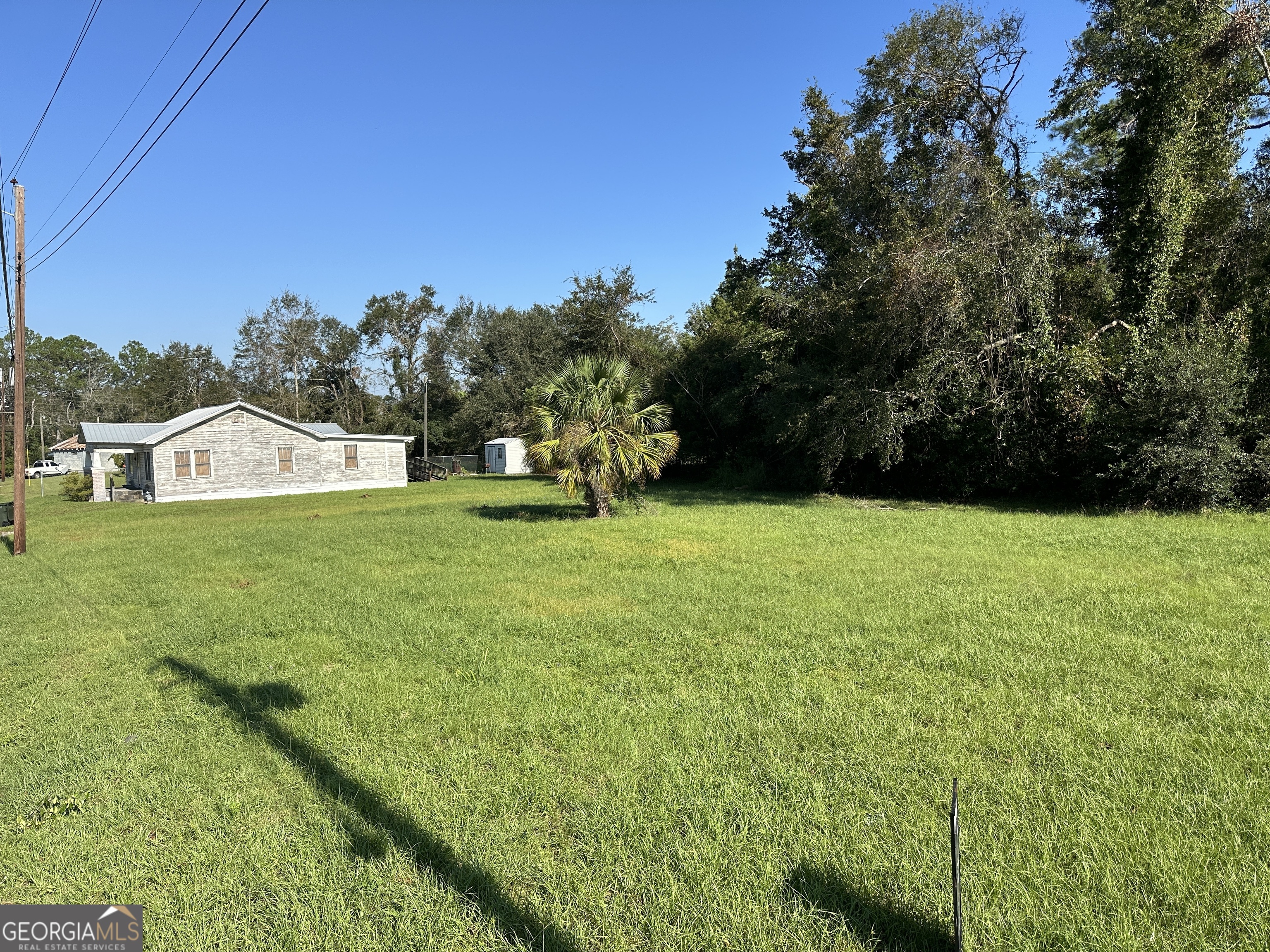 a view of an outdoor space and a yard