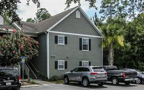 a car parked in front of a house