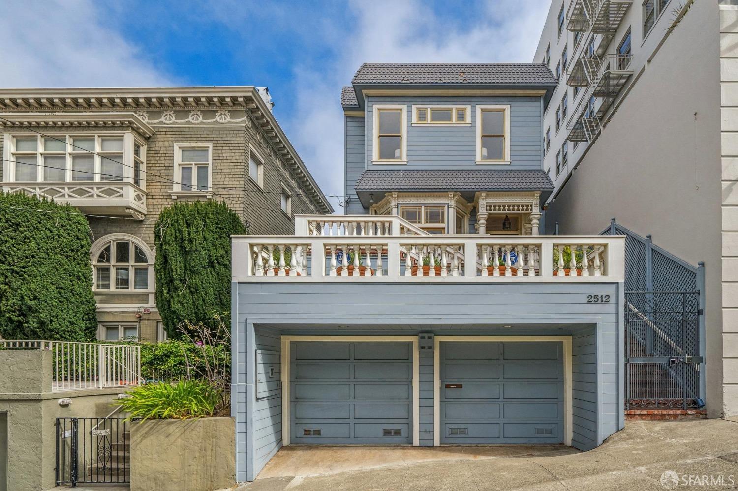 a front view of a house with balcony