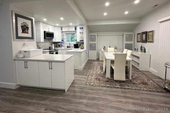 a view of kitchen with breakfast area