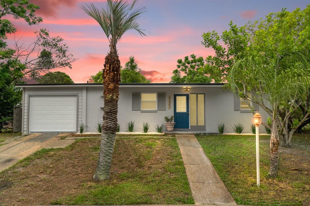 front view of a house with a yard