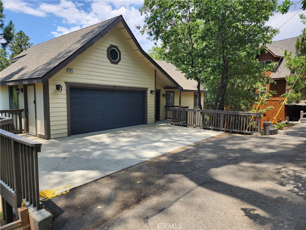 a front view of a house with a garage