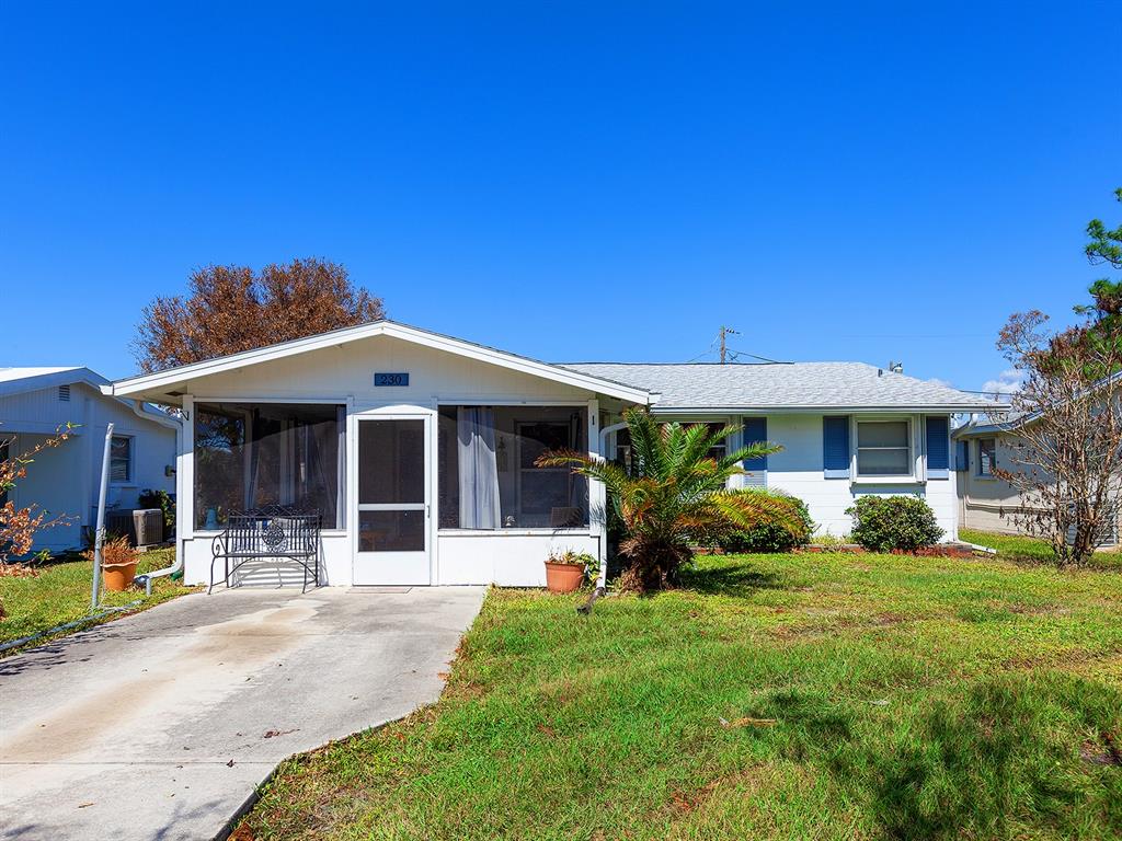 a front view of a house with a porch