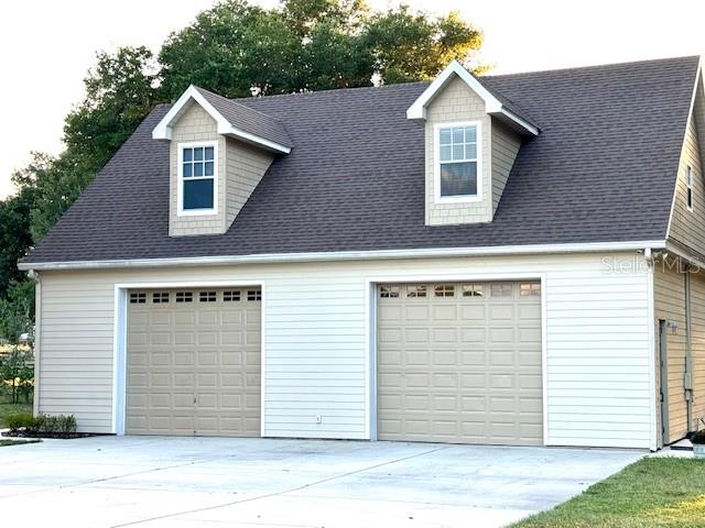 a front view of a house with a garage