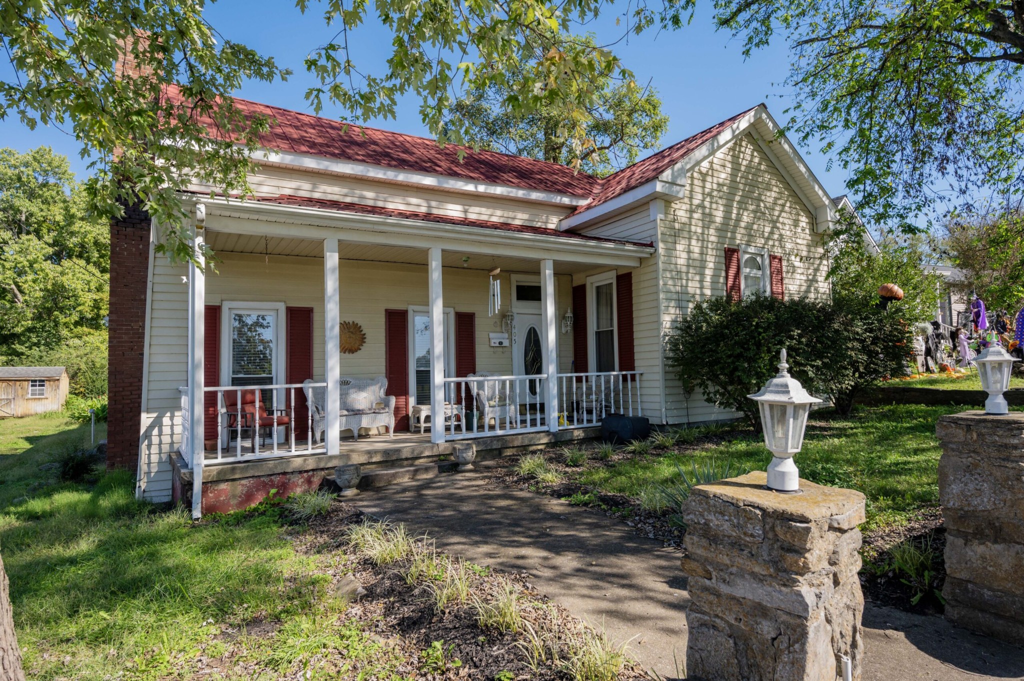 front view of a house with a yard