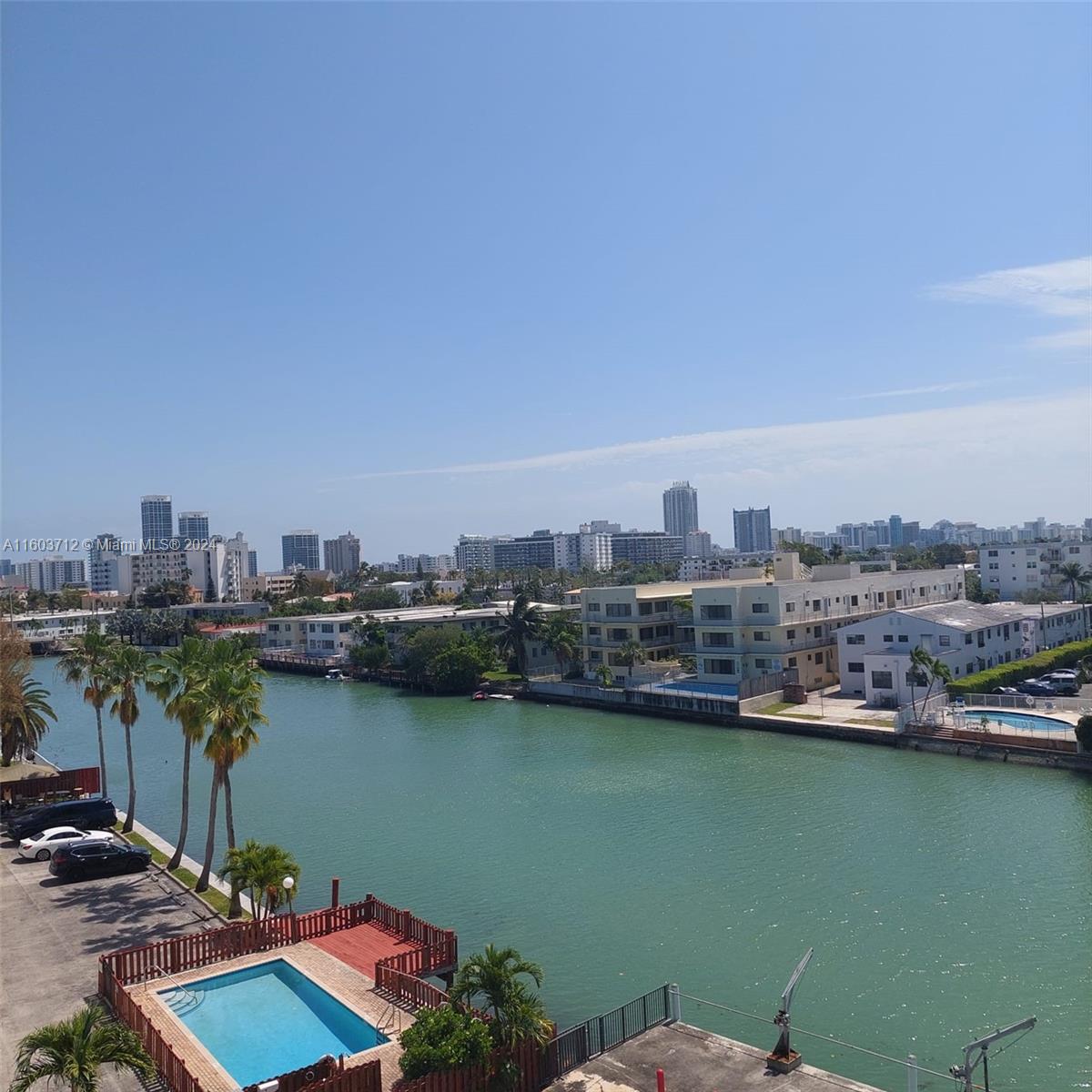 a view of a city with a lake