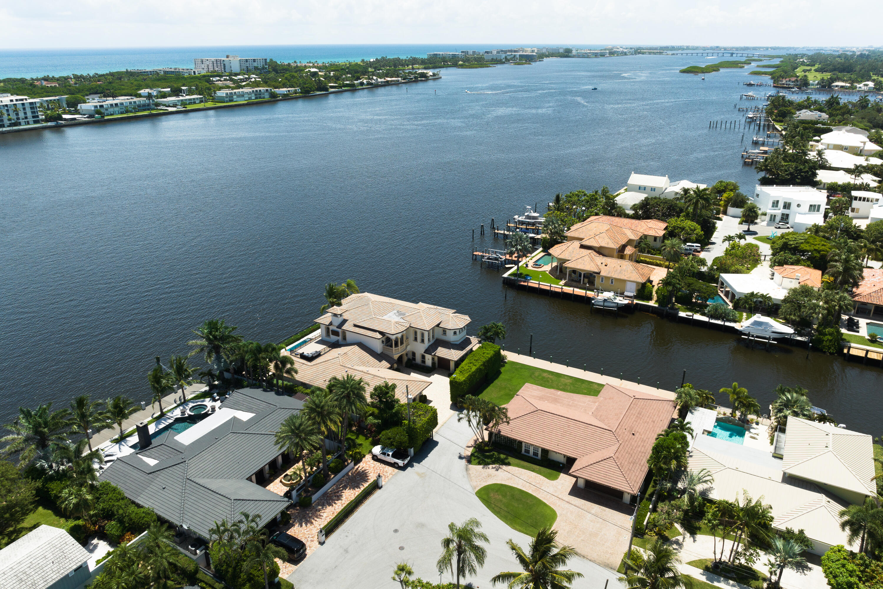 an aerial view of a house with a lake view