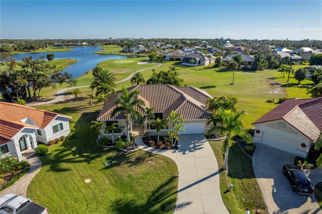 an aerial view of a house with a garden