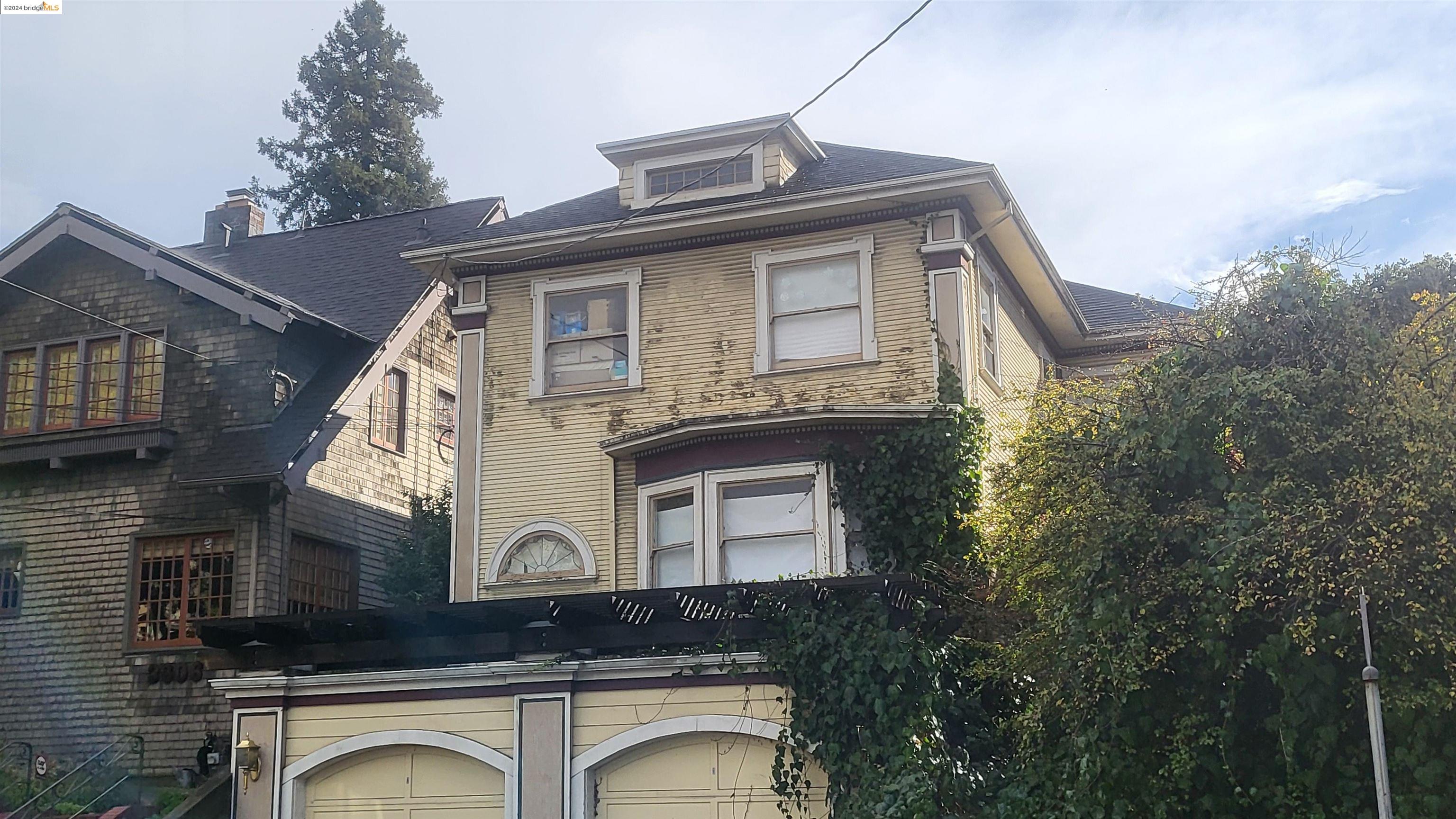 a front view of a house with garage