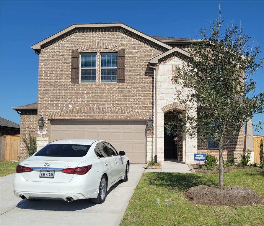 a car parked in front of a house