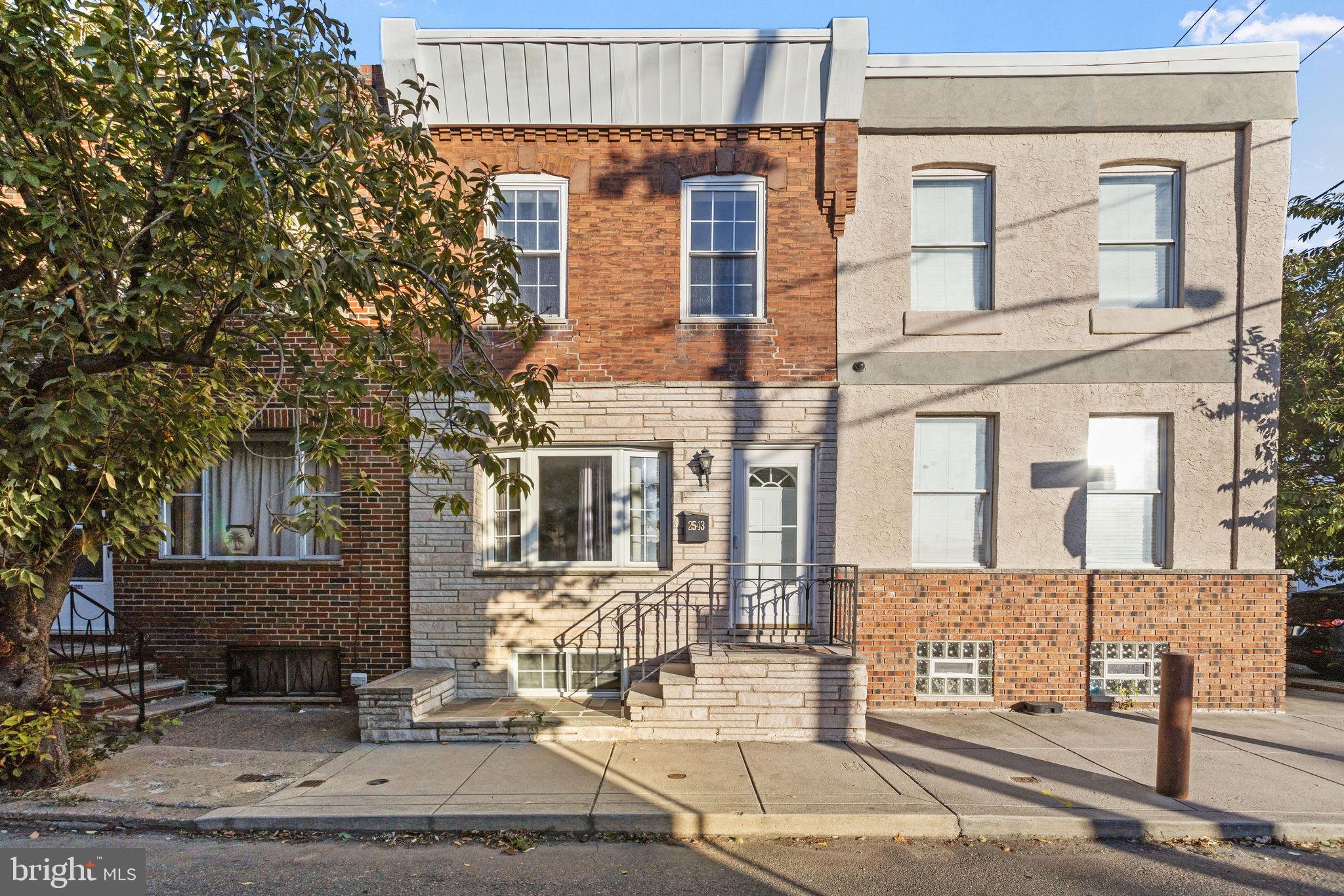 a front view of a building with street view