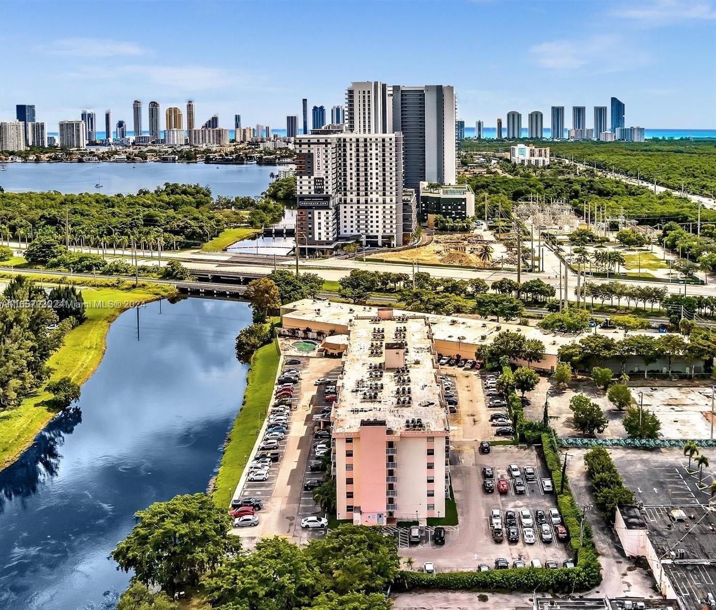 a view of a city with tall buildings