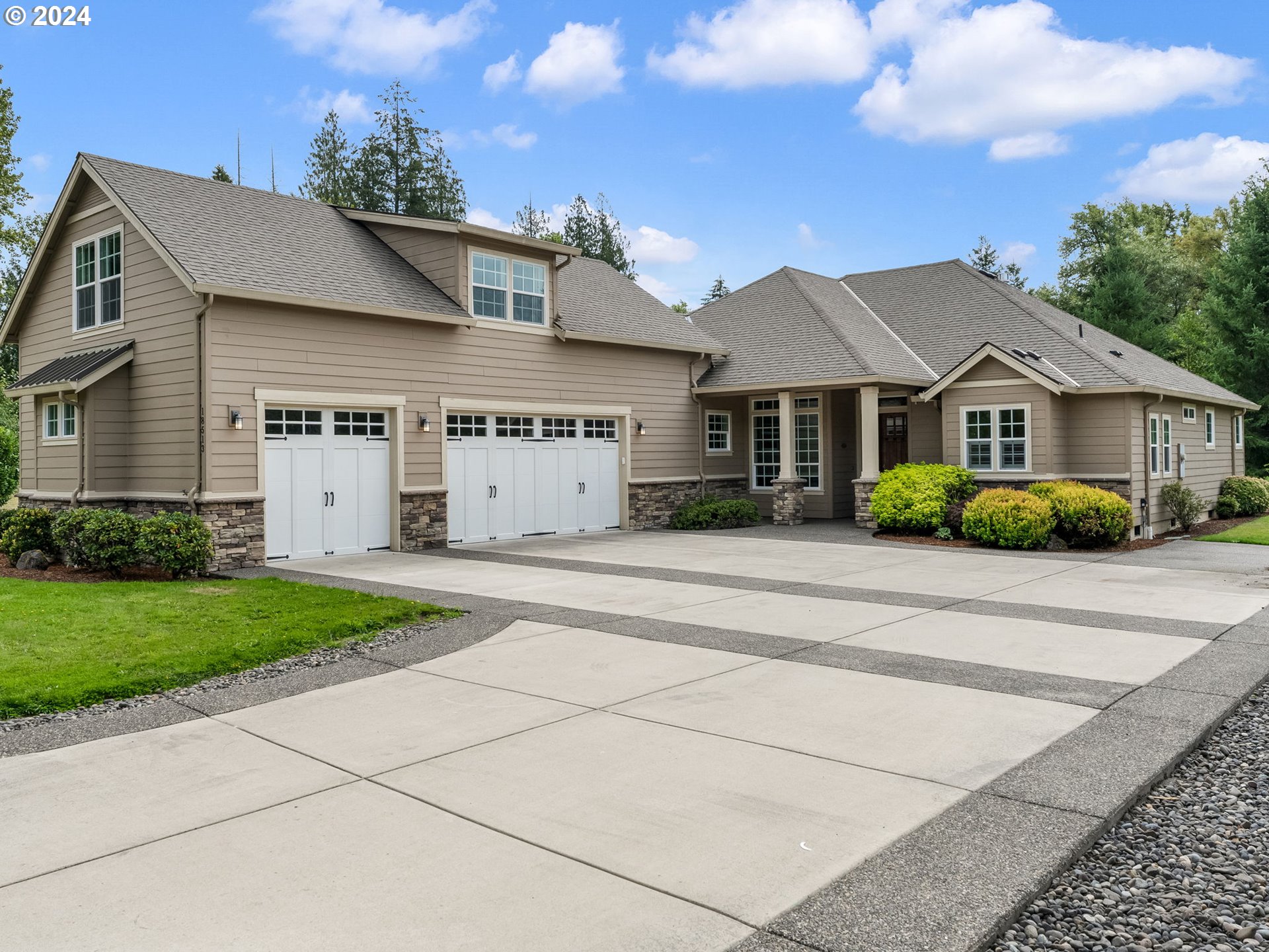 front view of a house with a street