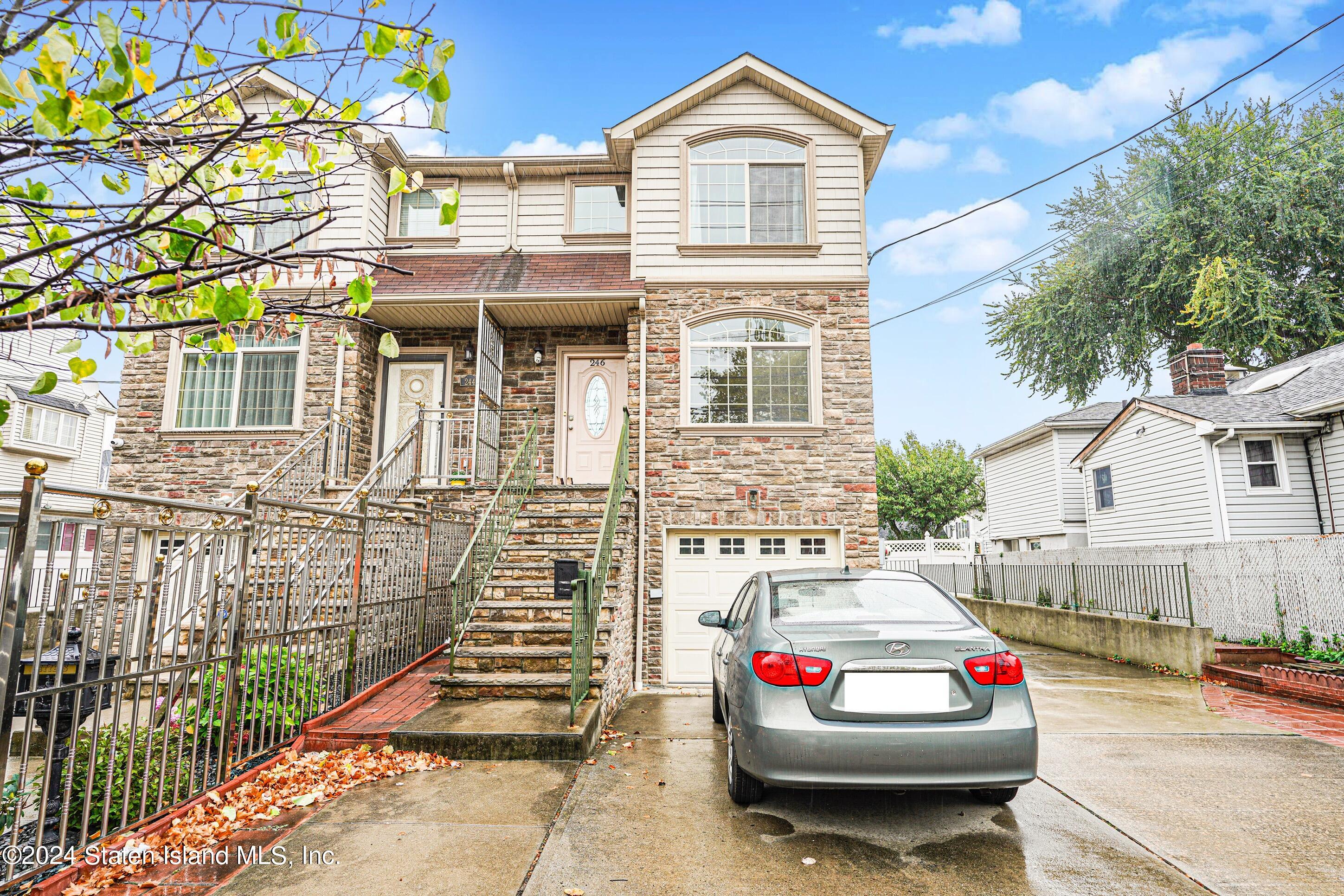 a car parked in front of a house