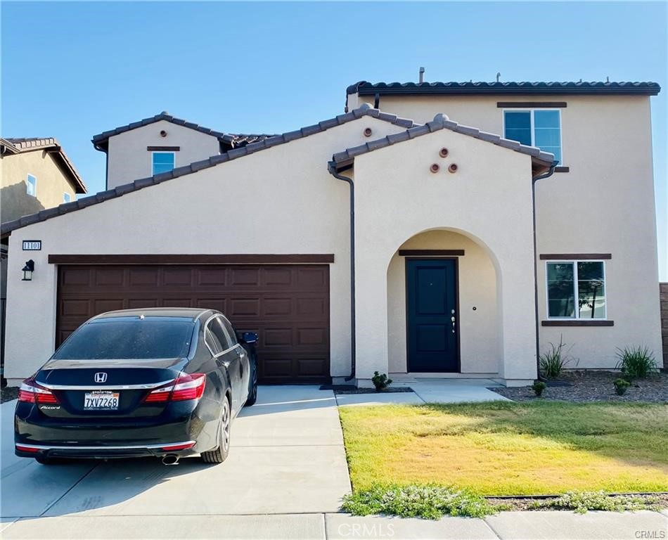 a car parked in front of a house