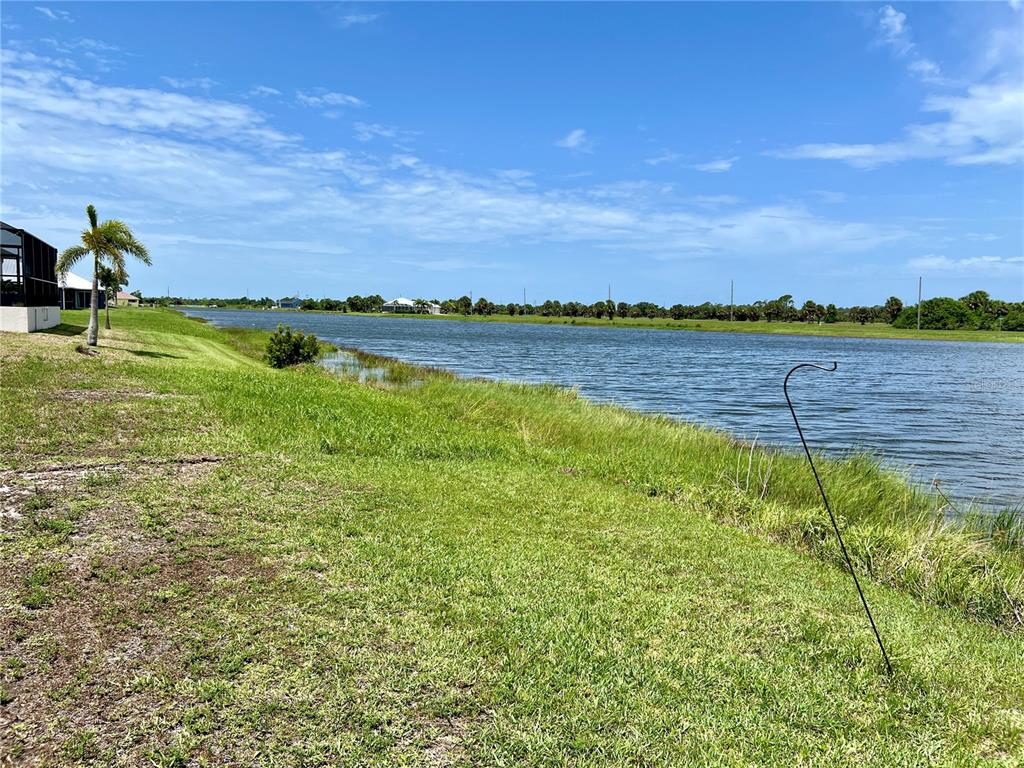 a view of a lake with a city