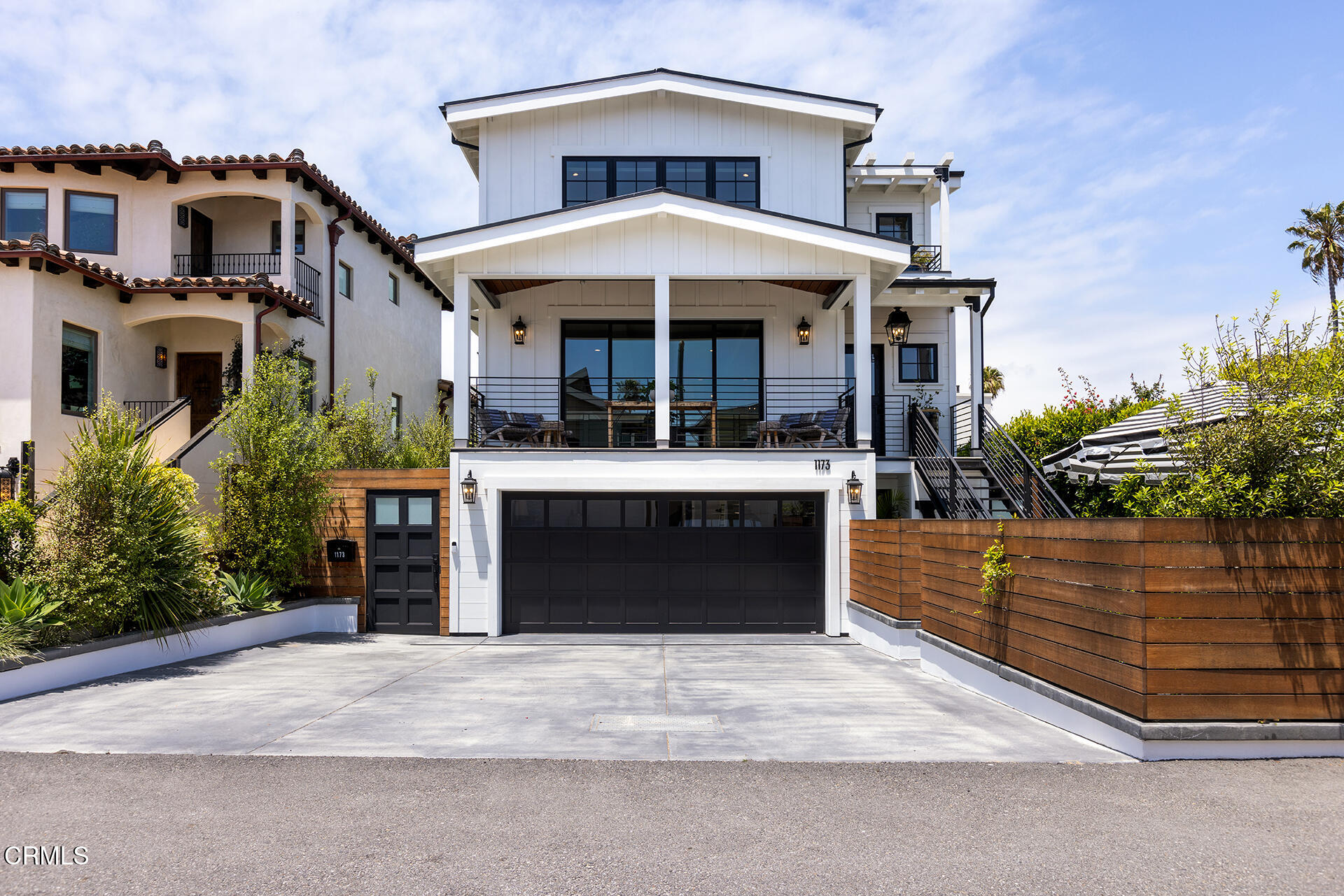 a front view of a house with yard