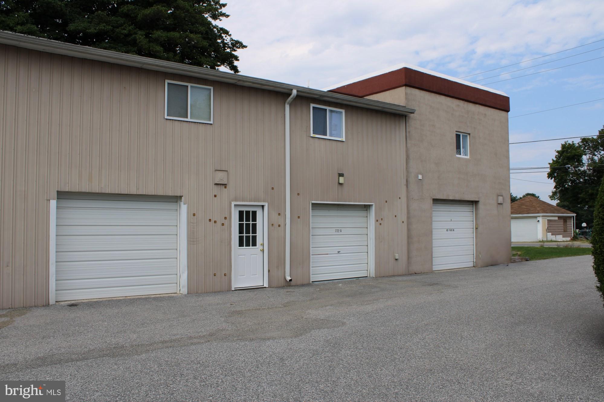 a view of a house with a garage