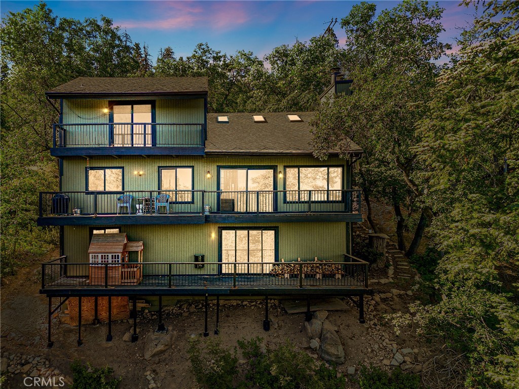 a house view with a lake view