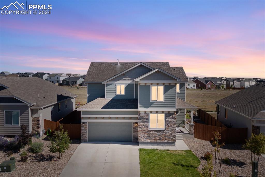 Evening view of this stunning Meridian ranch home!