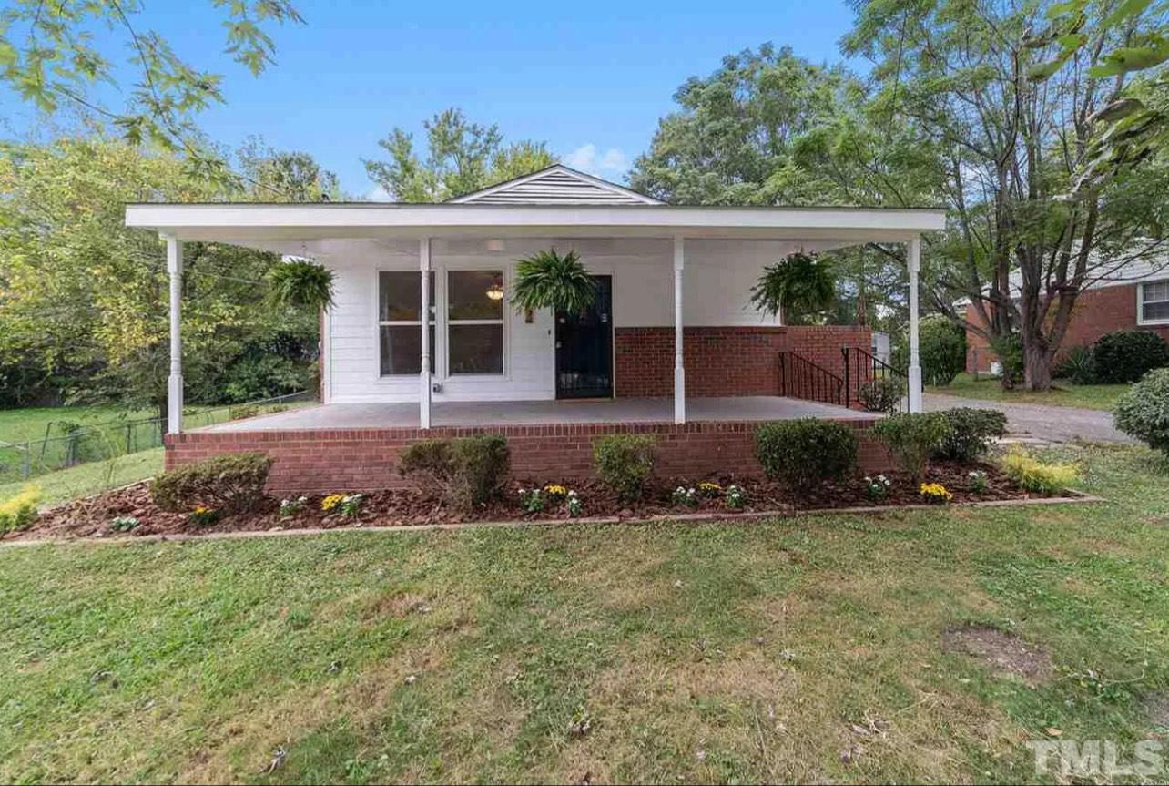 front view of a house with a yard