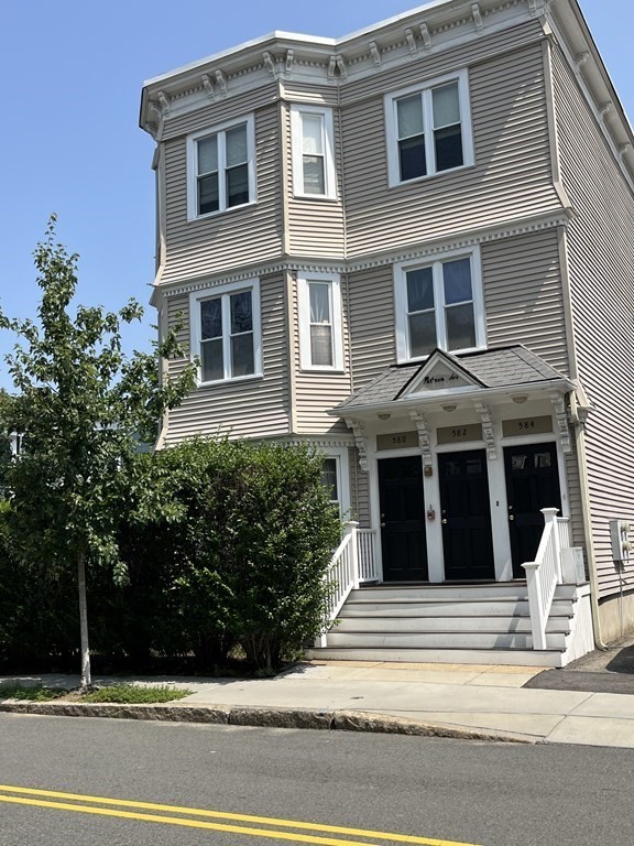 a view of a house with a garden