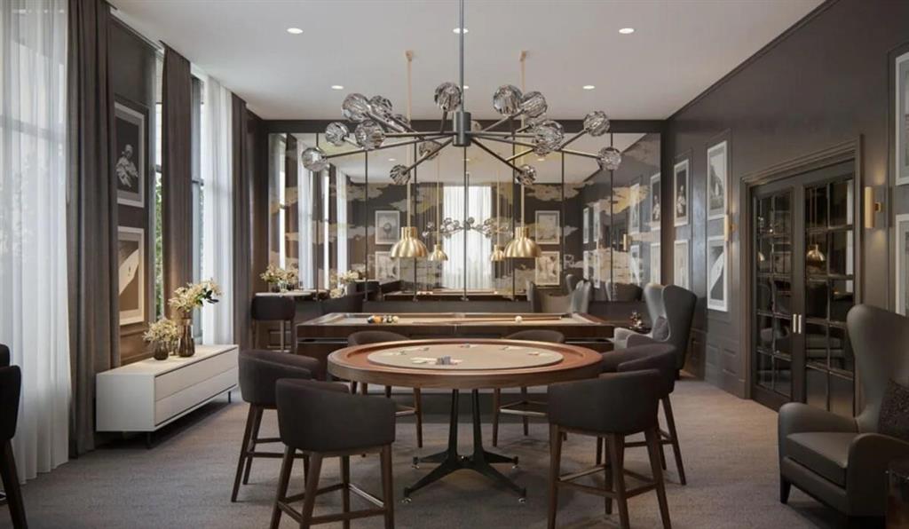 a dining room with furniture and window