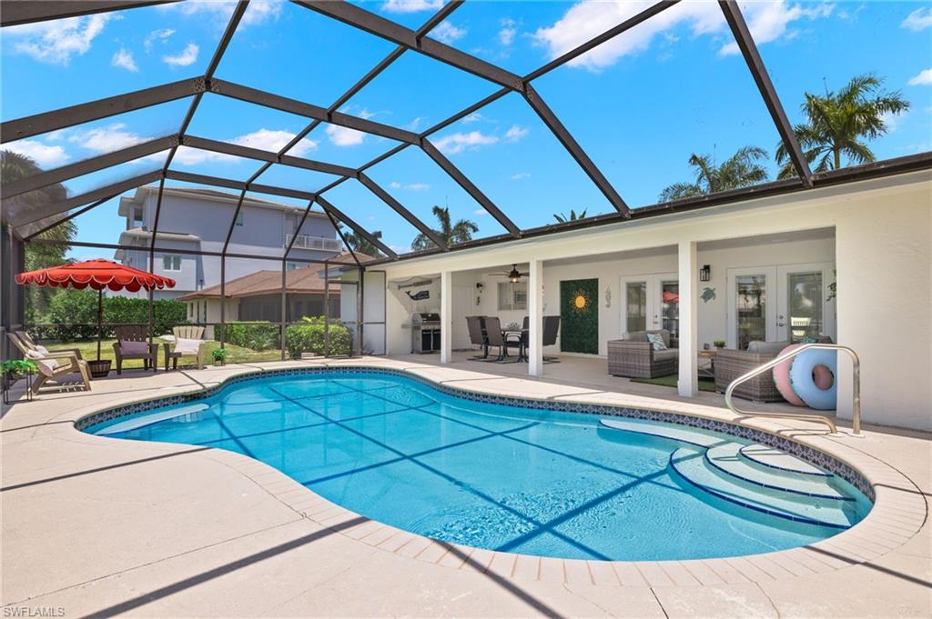 a view of a house with swimming pool