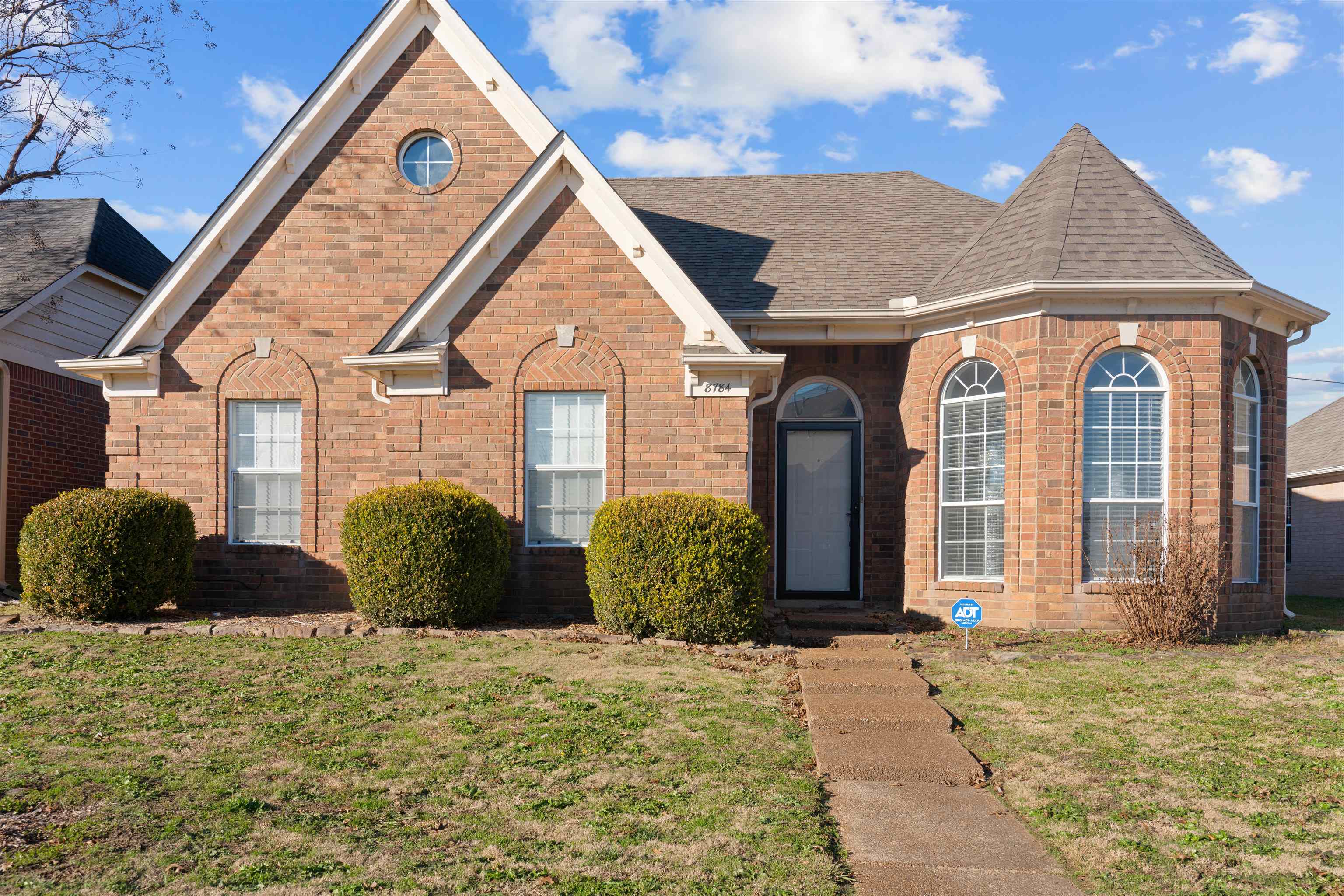 View of front facade with a front lawn